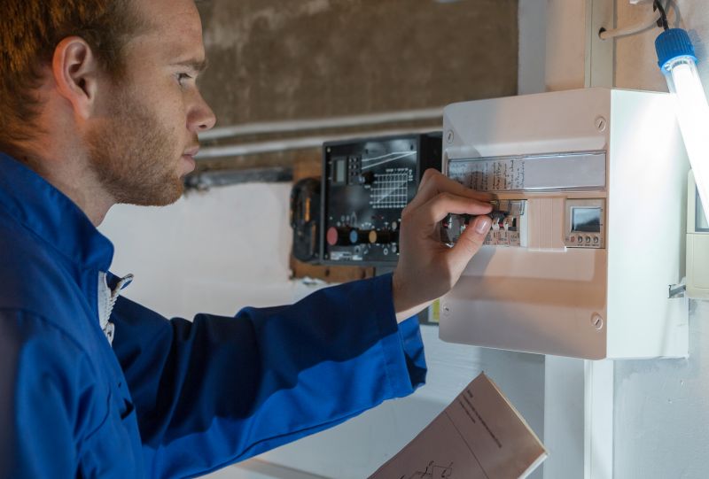 Professional Installing a Thermostat